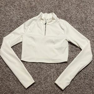 white xs gilly hicks athletic zip top, soft stretchy material